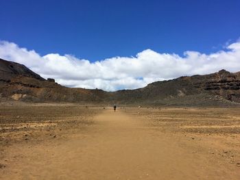Scenic view of desert against sky