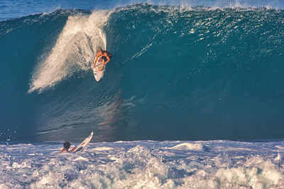 High angle view of person jumping in sea