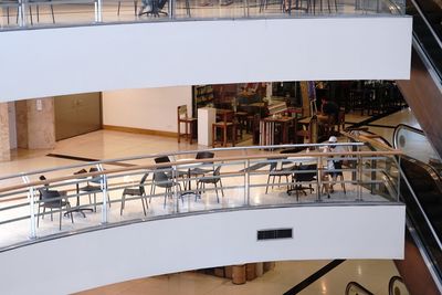 High angle view of chairs and tables in building