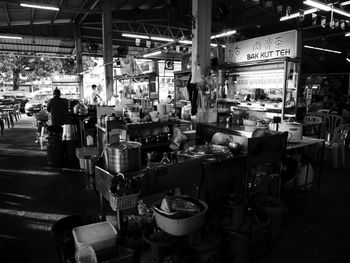 Group of people in market at night