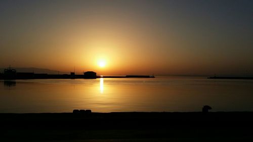 Scenic view of sea at sunset