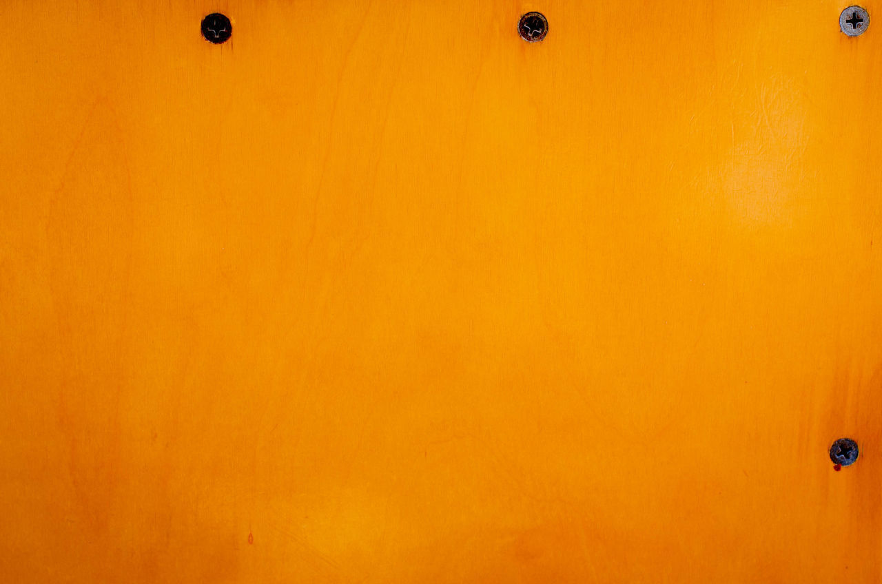 CLOSE-UP OF ORANGE YELLOW WALL