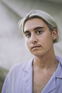 Portrait of non-binary person with medium-length hair