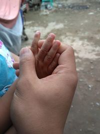 Midsection of woman with hands