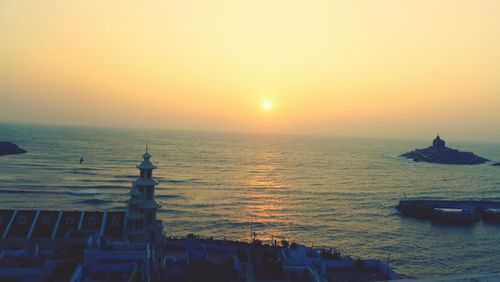 Scenic view of sea against sky during sunset