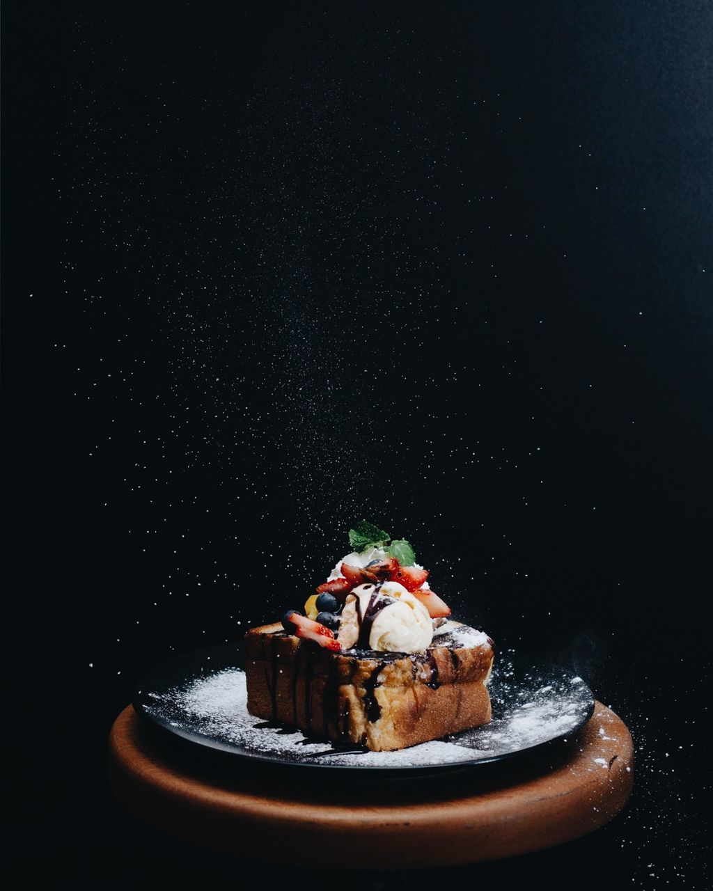 food and drink, food, sweet food, sweet, dessert, freshness, still life, indulgence, baked, plate, ready-to-eat, temptation, indoors, unhealthy eating, no people, cake, chocolate, studio shot, serving size, berry fruit, black background, snack, crockery