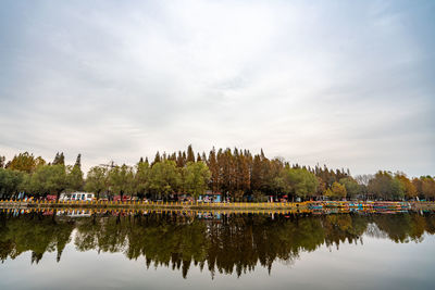 Lake and reflection in cloudy sky park