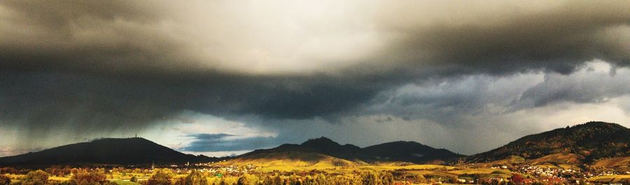 Panoramic view of landscape against dramatic sky