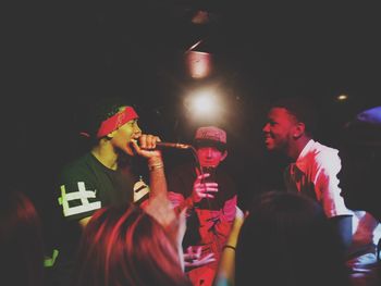 Silhouette of people at night