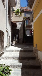 View of stairs along houses