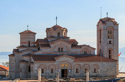 Exterior of historic church against clear sky