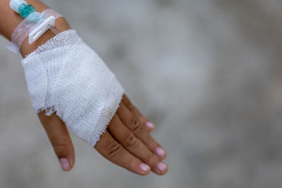 Close-up of hand with bandage