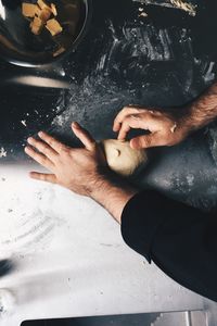 High angle view of woman preparing food