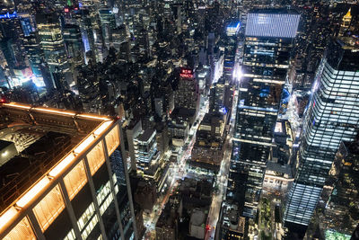 High angle view of illuminated cityscape at night