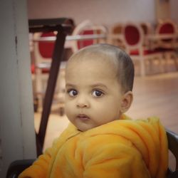 Portrait of cute baby boy at home