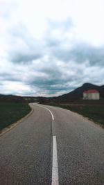 Empty road along landscape