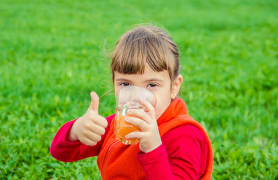 Young woman drinking water