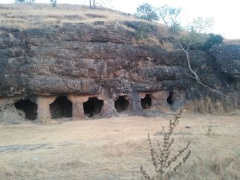 Built structure on land against sky