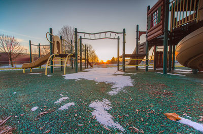 View of playground in park during winter