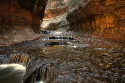 Water flowing through rocks in cave