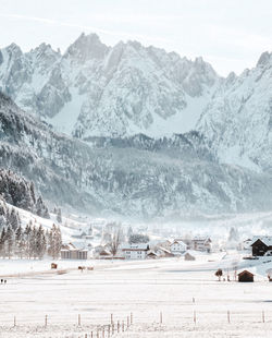 Scenic view of snowcapped mountains against sky