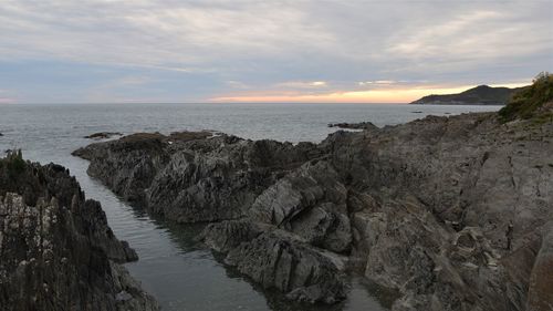 Panoramic view of sea against sky during sunset