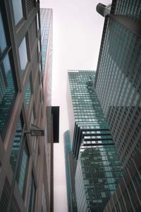 Low angle view of modern buildings against clear sky