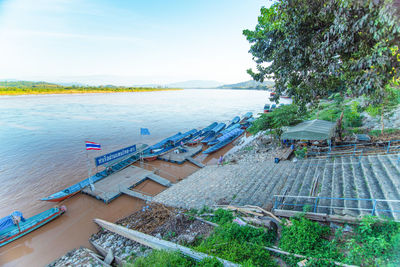 High angle view of swimming pool by sea against sky