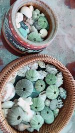 High angle view of candies in basket on table