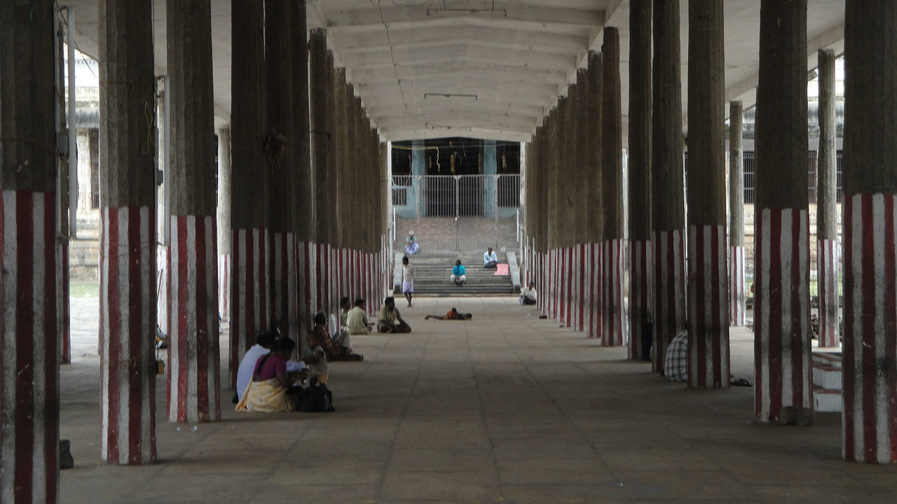 MAN IN CORRIDOR