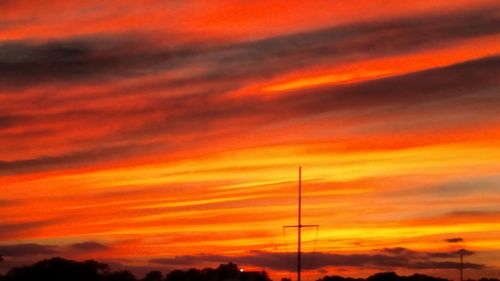 Low angle view of dramatic sky during sunset