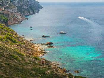 High angle view of sea and rocks