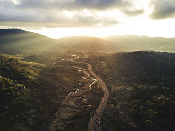 Scenic view of mountains against sky during sunset