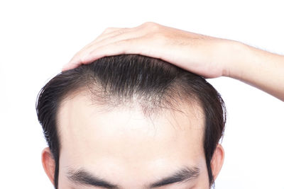 Close-up of man over white background