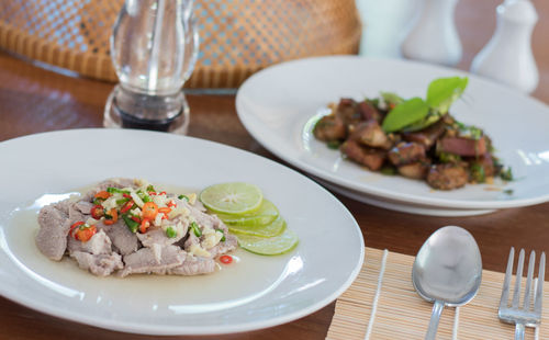 Close-up of food served on table