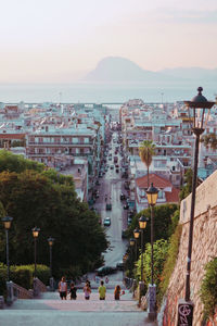 High angle view of buildings in town against sky