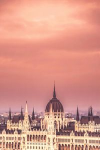 View of cityscape against sky during sunset