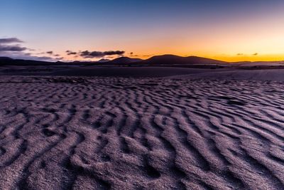 Scenic view of desert against sky