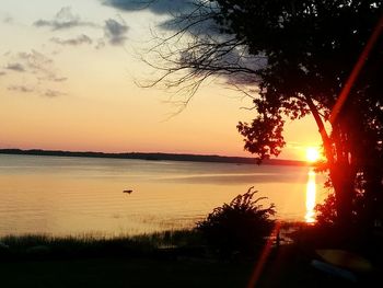 Scenic view of lake during sunset