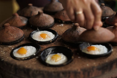 Close-up of person preparing food