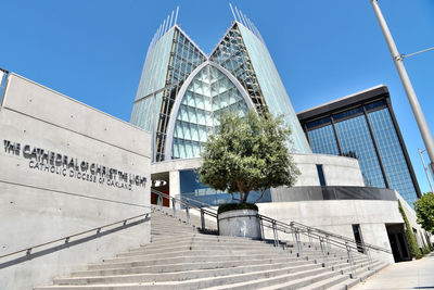 Low angle view of building against blue sky