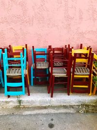 Empty chairs and tables at beach