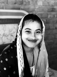 Portrait of smiling young woman