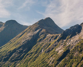 Green and rocky mountain range