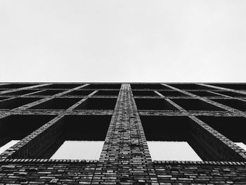 Low angle view of modern building against clear sky