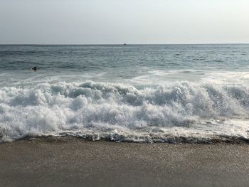 Scenic view of sea against clear sky