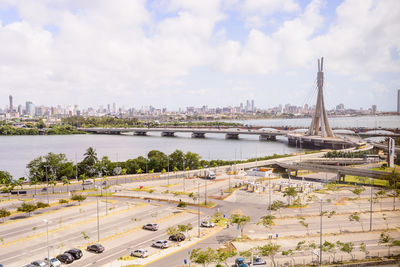 High angle view of bridge over river against cloudy sky