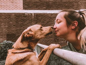 Full length of woman with dog