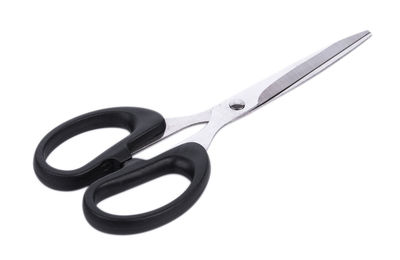 Close-up of scissors against white background