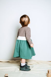 Baby fashion. unisex color clothes for babies. cute baby girls in neutral color palette cotton